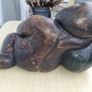A large wooden statue of a sleeping Buddha Image 5
