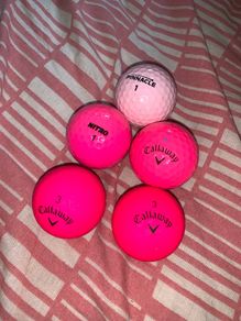 (5) Pink golf balls