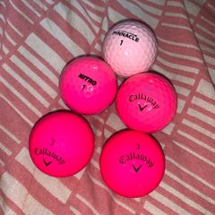 (5) Pink golf balls