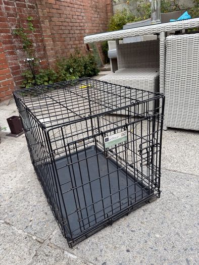 small dog crate with blackout cover