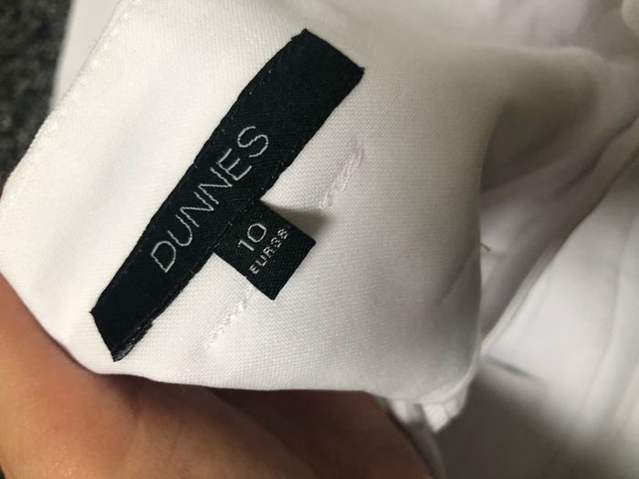 white trousers