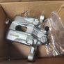 Hyundai ix35 rear left (passenger) brake caliper and alloy wheel Image 2