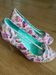 Brand new Iron Fist heels size 7