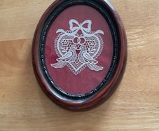 Hand laced lovebirds set in vintage frame