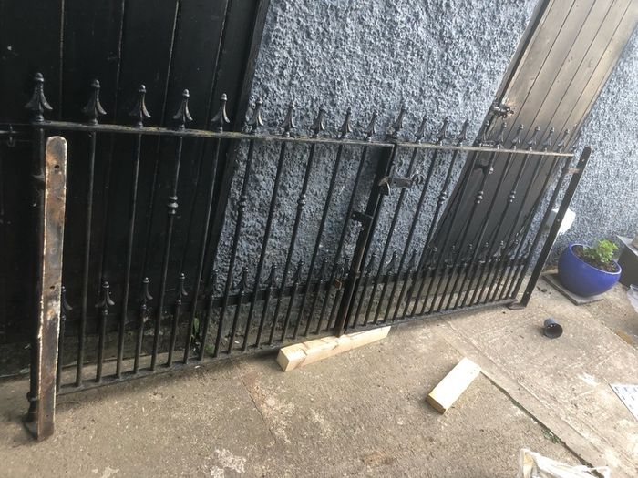 Set of wrought iron driveway gates and side gate