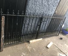 Set of wrought iron driveway gates and side gate