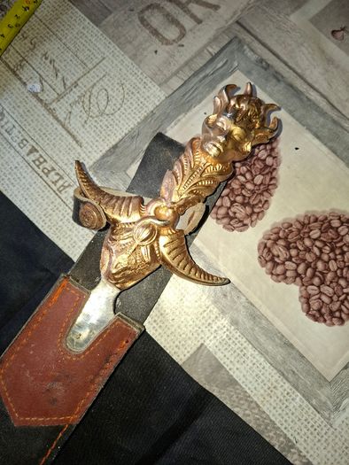 Antique Sword with Hilt, The hilt features a demonic face at the pommel, often representing a wrathful deity like Mahakala or Hayagriva Postage Available