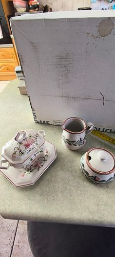 Sugar Bowl and Creamer, Hand Painted signed The Potter. po
