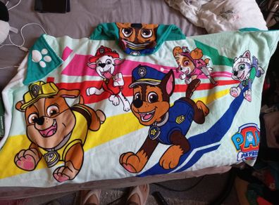A beautiful towel with a hood puppy patrol from Pampers.  New!