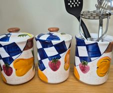 Storage containers and utensil holder