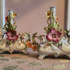 19th century pair of handpainted floral cherub porcelain candleholder/budvases