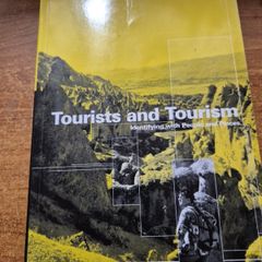 First Edition. Tourists and Tourism. Identifying with People and Places