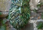green man wall plaque