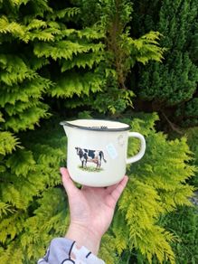 Cow mesuring cup possible to post