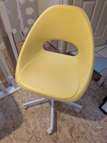 Free ikea yellow swivel chair
