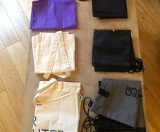 Collection of assorted tote and drawstring bags
