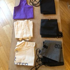 Collection of assorted tote and drawstring bags