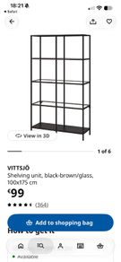 Black and glass open shelving unit Vittsjo