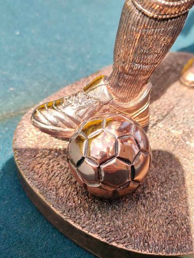Two Gilded footballers