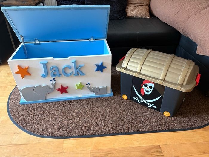x2 Toy storage boxes Personalized white toy box features a light blue cushioned seat, the name "Jack" and pirate plastic box with lead