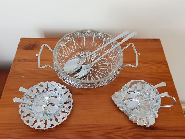 Vintage glass serving bowls sitting on chrome finish ornated frame/plates glass made in France by Reims, spoons in Sheffield