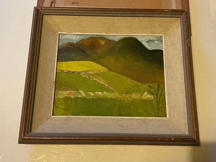 An original regional landscape painting depicting a mountainous Irish rural scene with traditional dry-stone walls, rolling green pastures, and a patch of bright yellow crop or gorse under an overcast sky