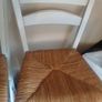 counter top high chairs, white with wicker seats. Slight wear as shown on 1 but 2 in very good condition. Slight distressed  style. Image 2