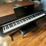 Yamaha Arius YDP-142 Digital Piano with rosewood finish and matching stool Image 3