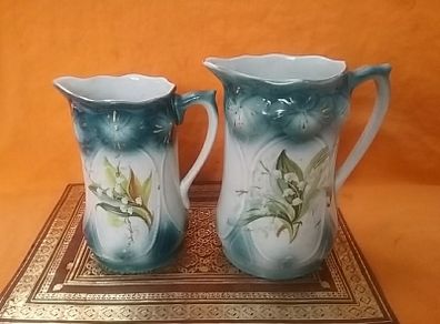 Two Graduated Antique Jugs