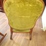 A Victorian Walnut upholstered Nursing Chair c1860 nicely Carved with Cabriole legs. It has Brass Castors. Image 7