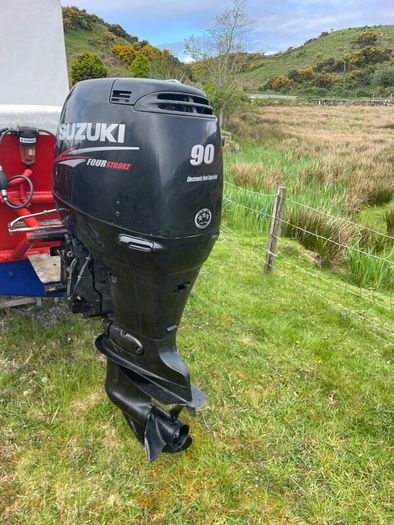Suzuki 90 HP 4 stroke long shaft.