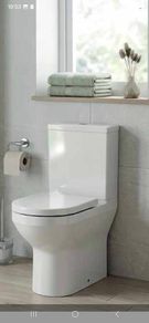 Kova comfort height toilet Fully back to wall and open back