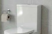 Kova comfort height toilet Fully back to wall and open back