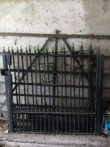 Heavy wrought iron decorative gates