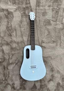 Blue Lava Touch Guitar - excellent condition/barely used. Original case and accessories included.