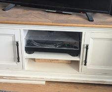 cream and wood TV cabinet