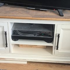 cream and wood TV cabinet