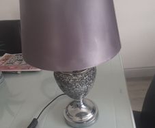 Table lamp with grey shade .Chrome and crackled glass .Can be seen working .Very modern .