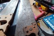 2 old hand saws