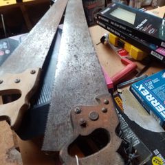 2 old hand saws