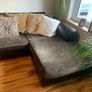 brown leather L-sofa and single armchair Image 8
