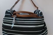 new Black and white stripe bag tag attached