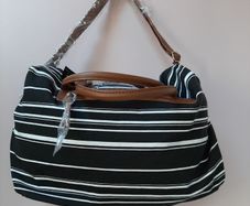 new Black and white stripe bag tag attached