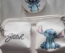 Stitch crossbody bag with matching purse.