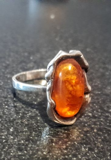 Large  sterling silver ring with amber