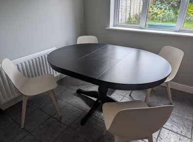 Extendable Black Dining Table & 4 Cream Chairs