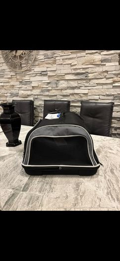 Pet carrier , dog