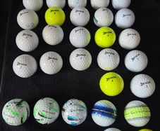 32 srixon and Taylormade balls