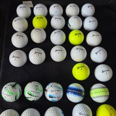 32 srixon and Taylormade balls