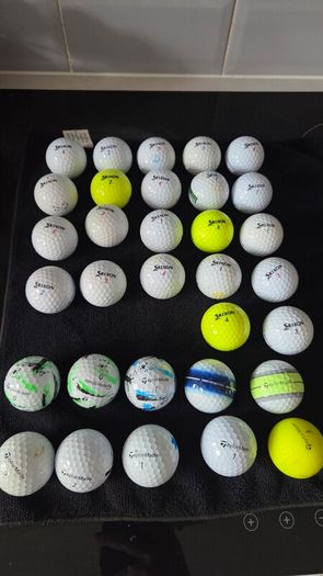 32 srixon and Taylormade balls